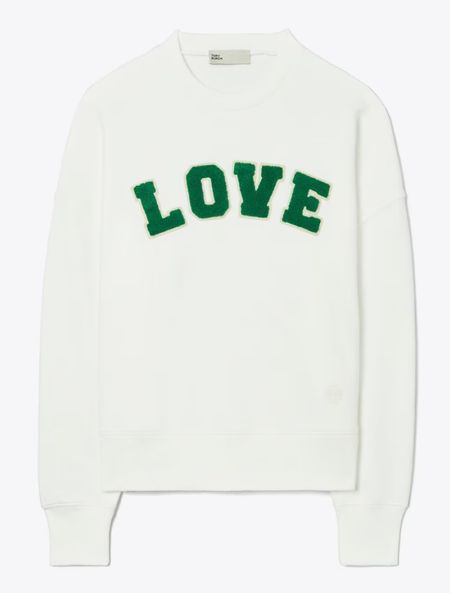 Tory Burch Sport FRENCH TERRY LOVE CREW. From our Love capsule, a cozy sweatshirt inspired by vintage collegiate sportswear. The Love crew updates a timeless layer with varsity letters in chenille appliqués. The relaxed sweatshirt is soft and comfortable in French terry cotton. Read less.

#LTKSeasonal #LTKMostLoved #LTKstyletip