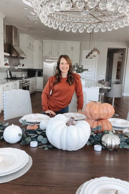 Fall Tablescape and pumpkin decor, Fall sweater, Amazon Fall Outfis, Halloween table decor, Round Dining Room Tables

Wearing a size small in the sweater. Has some length to it. So cozy and soft! Love this sweater for Fall. Under $30!

American Eagle jeans are some of my fave fit. Size 4  

Fall style, brunch outfit, dinner date casual outfit, teacher outfits, fall photo, work outfit 

Chandelier, neutral area rug

#LTKhome #LTKHalloween #LTKstyletip