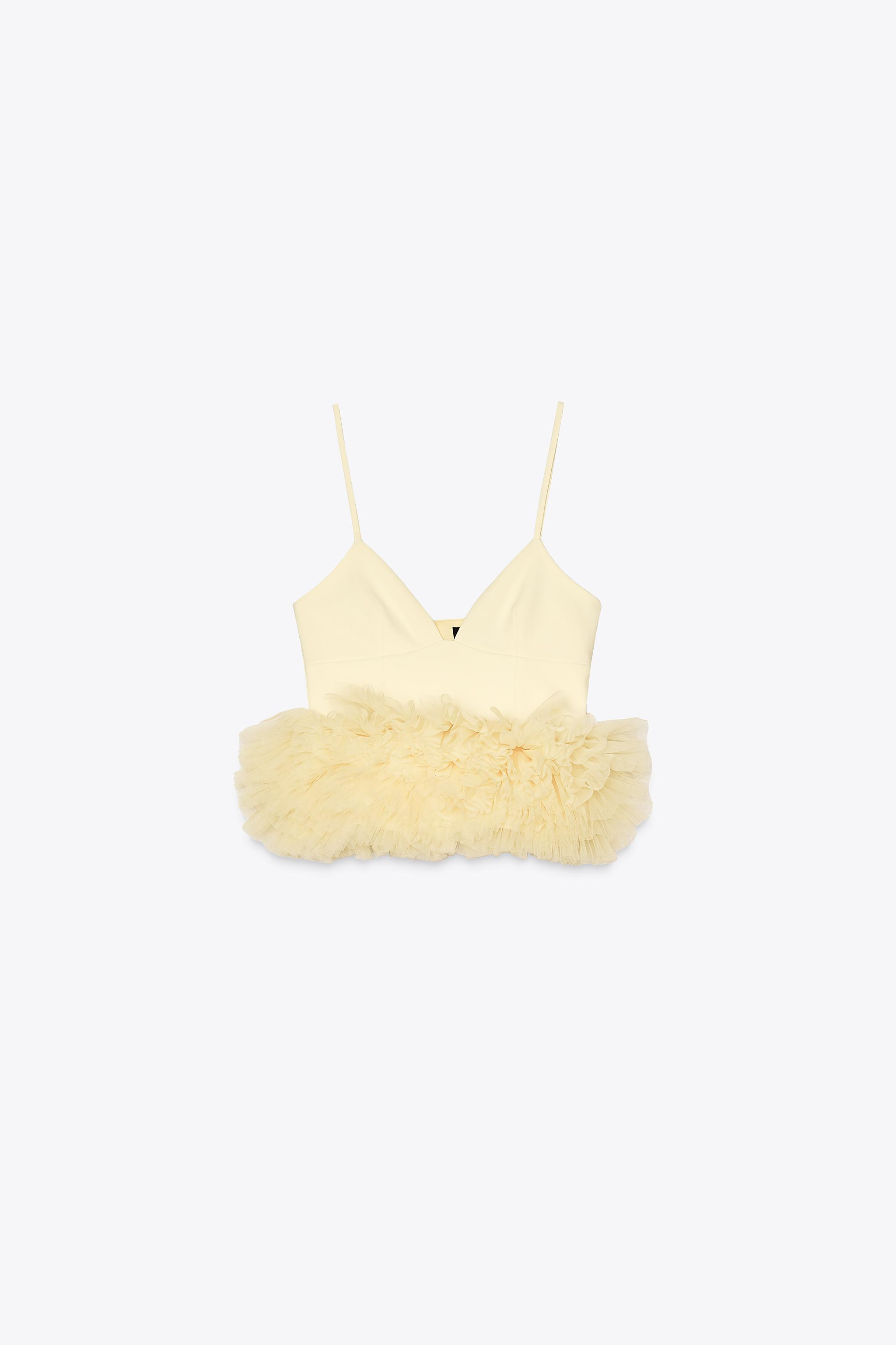 Stretch knit top. V-neck and adjustable spaghetti straps. Tonal tulle appliqué with voluminous h... | Zara US