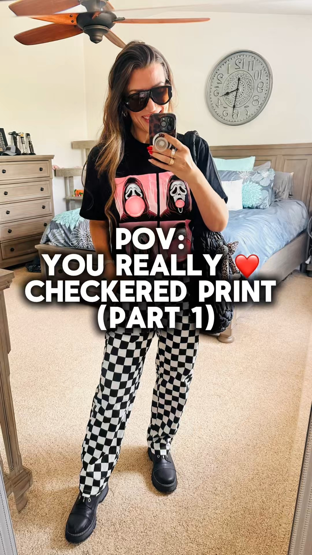 Where are my ghostface fans at? #IYKYK 👻.  Love the bubblegum pink touch to the T-shirt.  And I know this bold + fun checkered print isn’t for everyone but I LOVE it! 😻 

Top & pants are size M.
My boots are old so I can’t link them, but I found similar for you 😘 .

#LTKHalloween #LTKStyleTip #LTKFindsUnder50