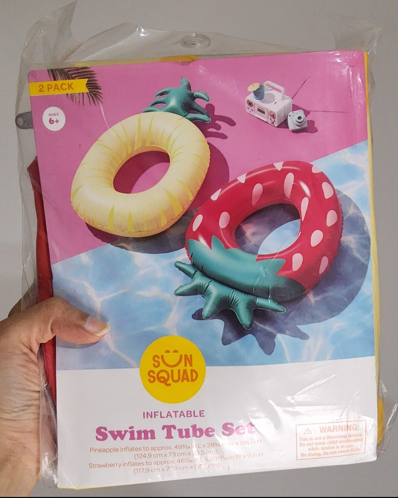 Sun Squad Swim Tube set comes in two individual inflatables. One inflatable is in a strawberry shape and the other is in a pineapple shape. They're quore easy to fill with air. I love that the air stays in and one needs to really press it down to remove all air. They're super cute designs too and they're really big. The holes/circles are large enough to easily fit in. It's definitely a fun product to have at home. 

#LTKSwim #LTKSeasonal #LTKParties