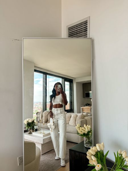 All white for summer? Ground breaking. The top is the “micro modal knotted crop top” from Naked Wardrobe. Wearing a size IT 40 in the jeans 

#LTKStyleTip