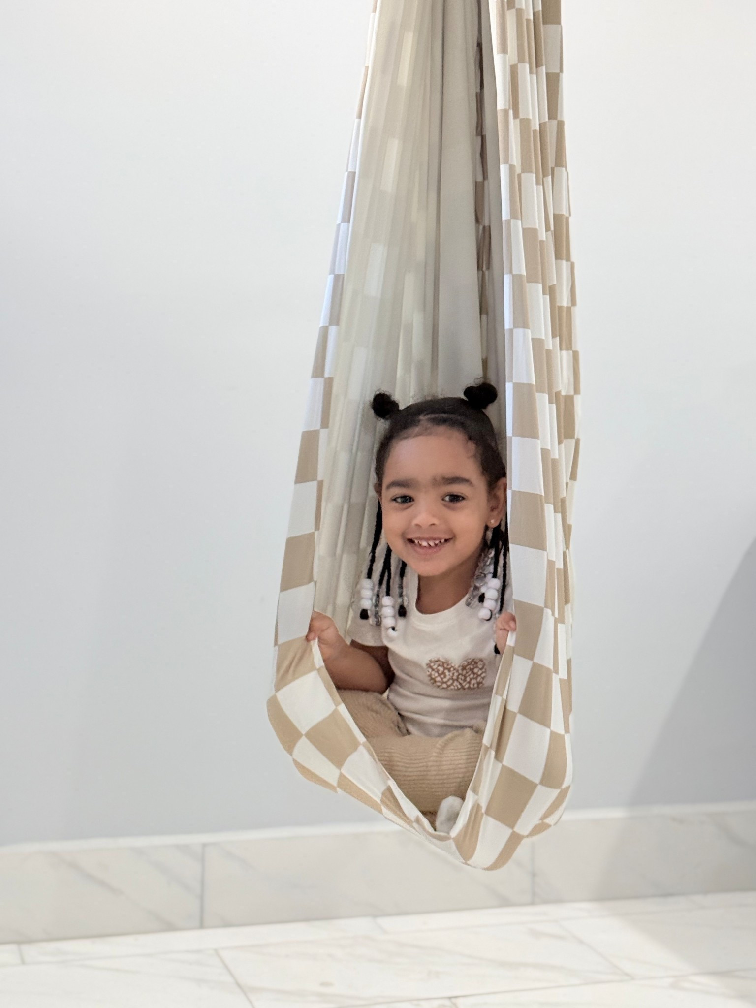 One of my biggest dreams has always been to create a sensory room—not just for my children, but for any little ones who come into our home. A space that feels safe, inclusive, and comforting. A place where feelings can be released, imaginations can run free, and little nervous systems can learn to rest and regulate.

That dream is slowly becoming a reality. Our sensory room is filling up with love and intention—from art supplies for creative expression, to a cozy couch perfect for cuddles and quiet time, to the softest weighted blankets. 

And now, the newest addition: a sensory swing that feels like a hug from @bounceeco 🤍 

The movement, the coziness, the joy it brings… it’s everything I envisioned and more.

Watching this space come together piece by piece is a reminder that healing, support, and creativity can live under one roof. And I’m so grateful to be building it ✨ 

Comment SWING and I’ll send you the direct link 🫶🏼

#sensoryroom #sensoryplayideas #sensoryswing #neurodivergent #adhd #autism #medicallycomplex #bouncee #ltk 

#LTKGiftGuide #LTKHome #LTKKids