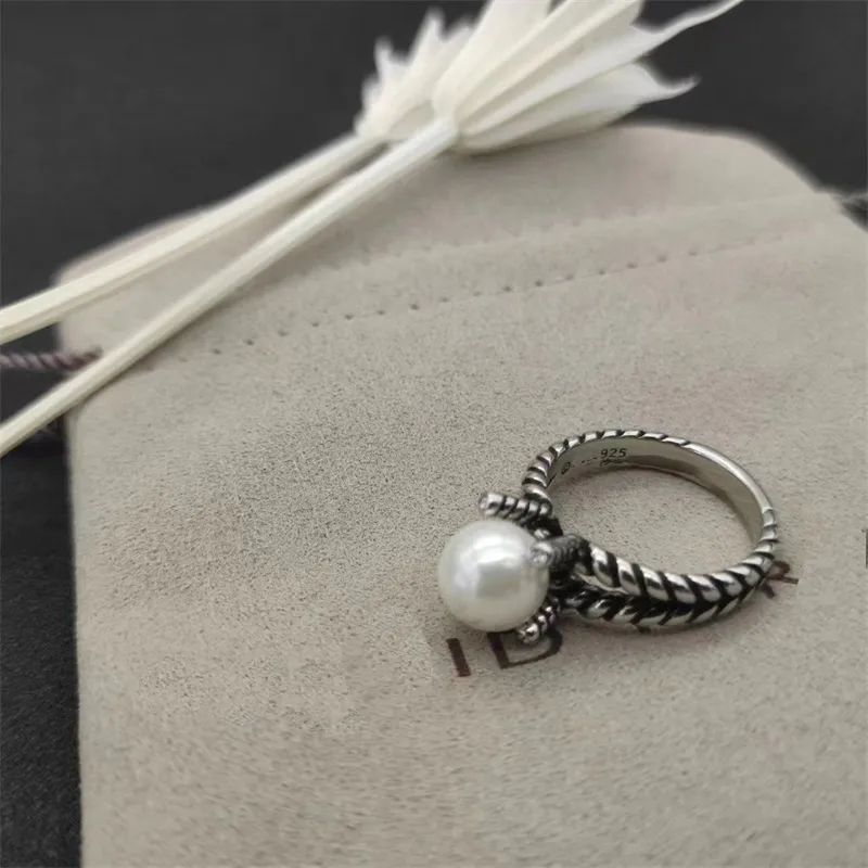 Selling Designer DY Hot Band Rings Twisted Two Color Cross Pearls Ring For Women 925 Sterling Sil... | DHGate