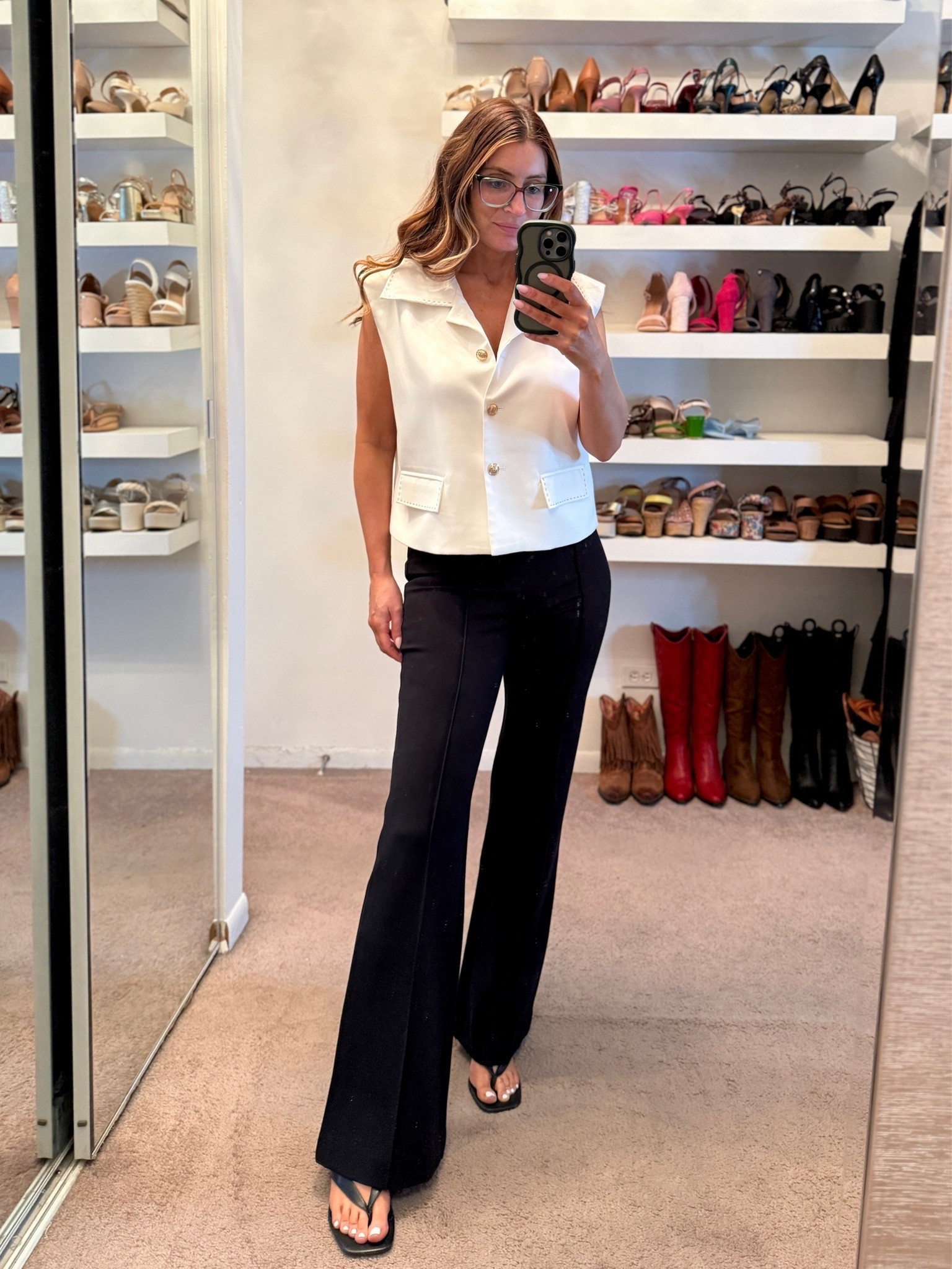Loving this simple outfit for work or date night!
Amazon sleeveless vest with shoulder pads (size small)
Spanz flare leg dress pants (size medium)
Black flip flop kitten heels

#LTKootd #LTKOver40 #LTKWorkwear