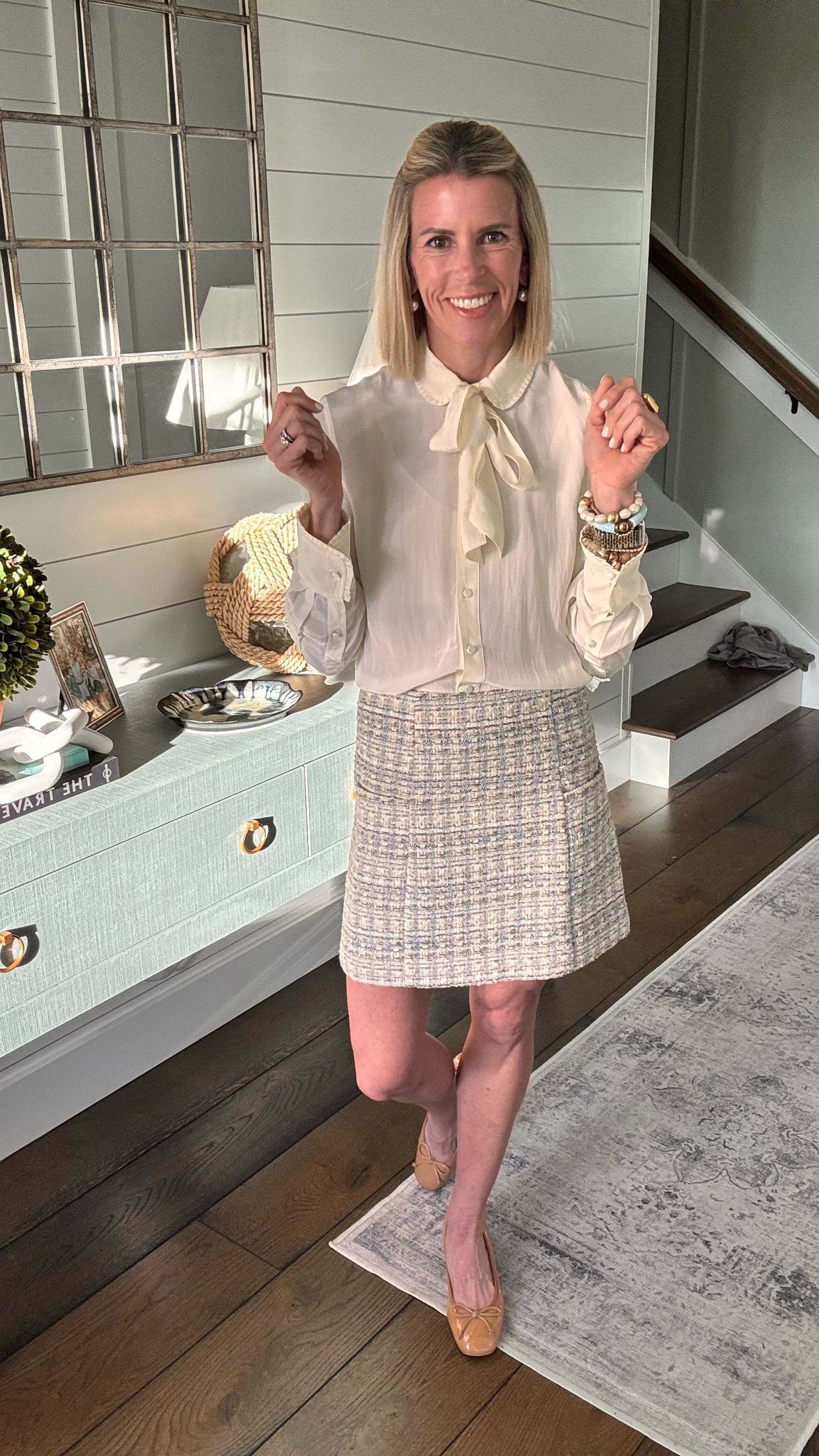 Spring trend: lady like details, bows & tweed!!  Checking all the boxes today in this beautiful outfit 🎀🫶🏻. Wearing an XS in one of my favorite blouses that is on sale 😉 and a 2 in the skirt!  Love the metallic and blue woven throughout!! 

#LTKOver40 #LTKWorkwear #LTKStyleTip