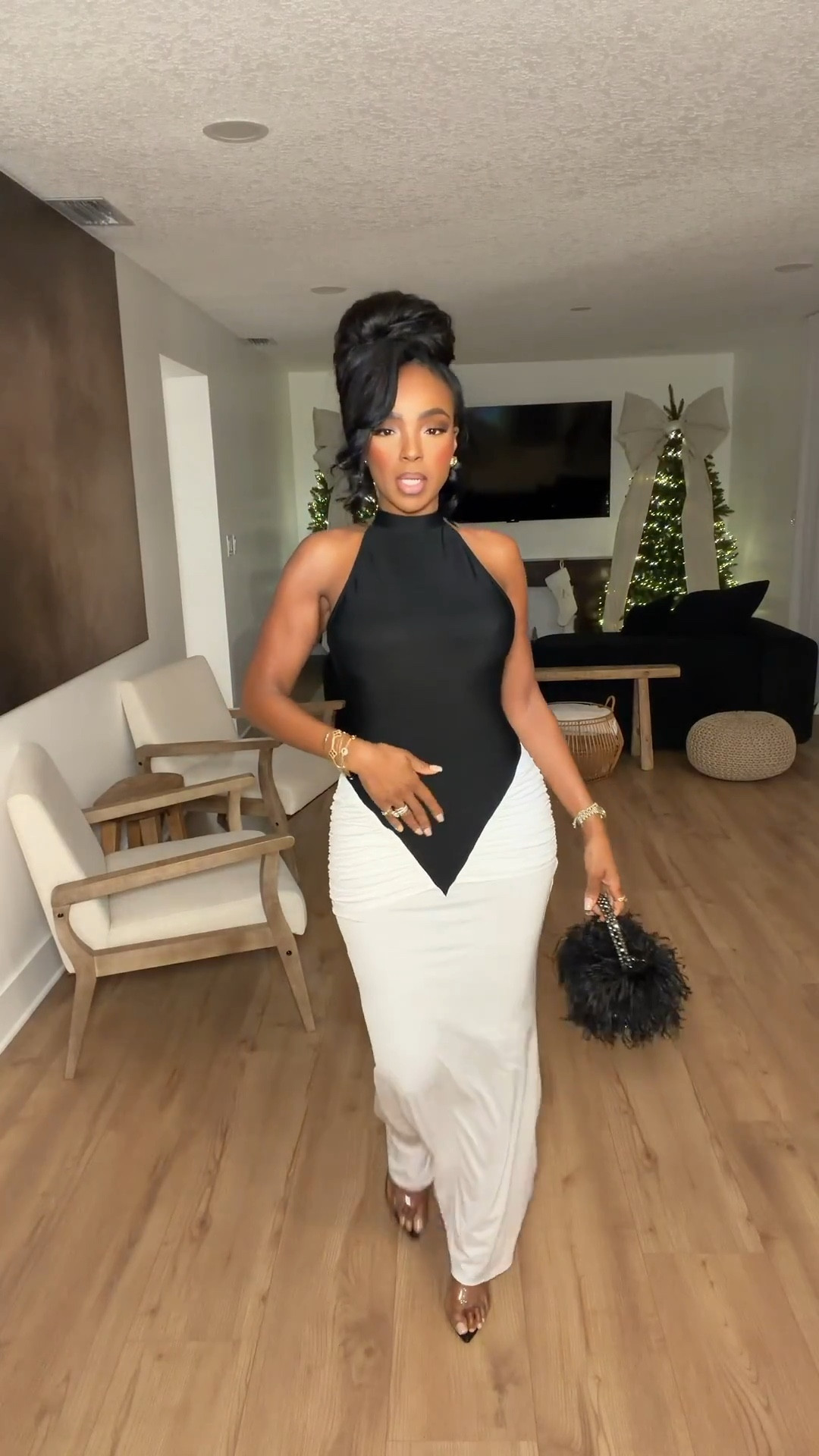 A sleek holiday moment — this backless halter top paired with the ruched white maxi skirt is the definition of effortless glam. Chic, minimal, and perfect for every festive night out.

Perfect for holiday parties, winter celebrations, and elegant evening plans.

backless halter outfit inspiration, ruched white skirt styling, chic neutral holiday look, minimal evening outfit ideas, elegant night-out fashion.

📏 Sizing: Skirt (0) • Top (XS)
Measurements: 5’4” · 138 lbs · 34D · 27” waist · 40” hips

✨ Everything linked below for easy shopping

Follow me on Instagram and YouTube @kirasfashionfinds

#LTKootd #LTKHoliday