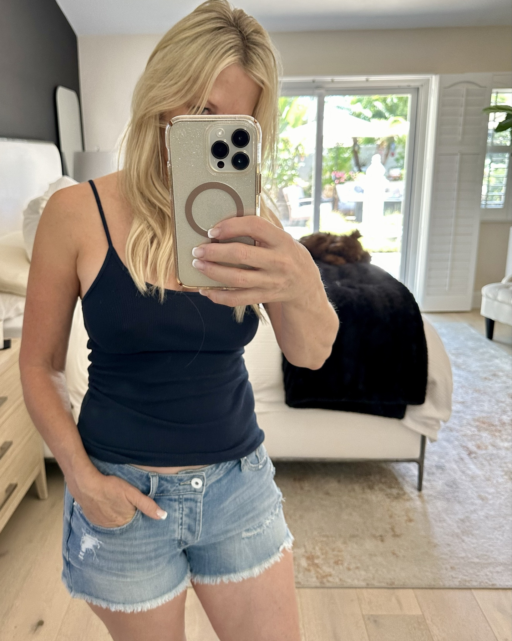 OOTD - Enjoyed a casual day at home in these cute button up denim shorts.  These would be great to wear to a country concert with boots. The fabric has some stretch, but they run small. I am wearing a medium. 

Red Carpet of Life, cut off shorts, jean shorts, summer outfit 

#LTKBacktoSchool #LTKSeasonal #LTKFindsUnder100