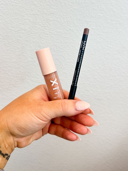 Easy lip combo for my neutral loving girls! I love this lux lip oil- so soft and hydrating on the lips! 

Lip Pencil - Nude Truffle 
Lip Oil - Skinny Dip

#LTKbeauty #LTKunder50
