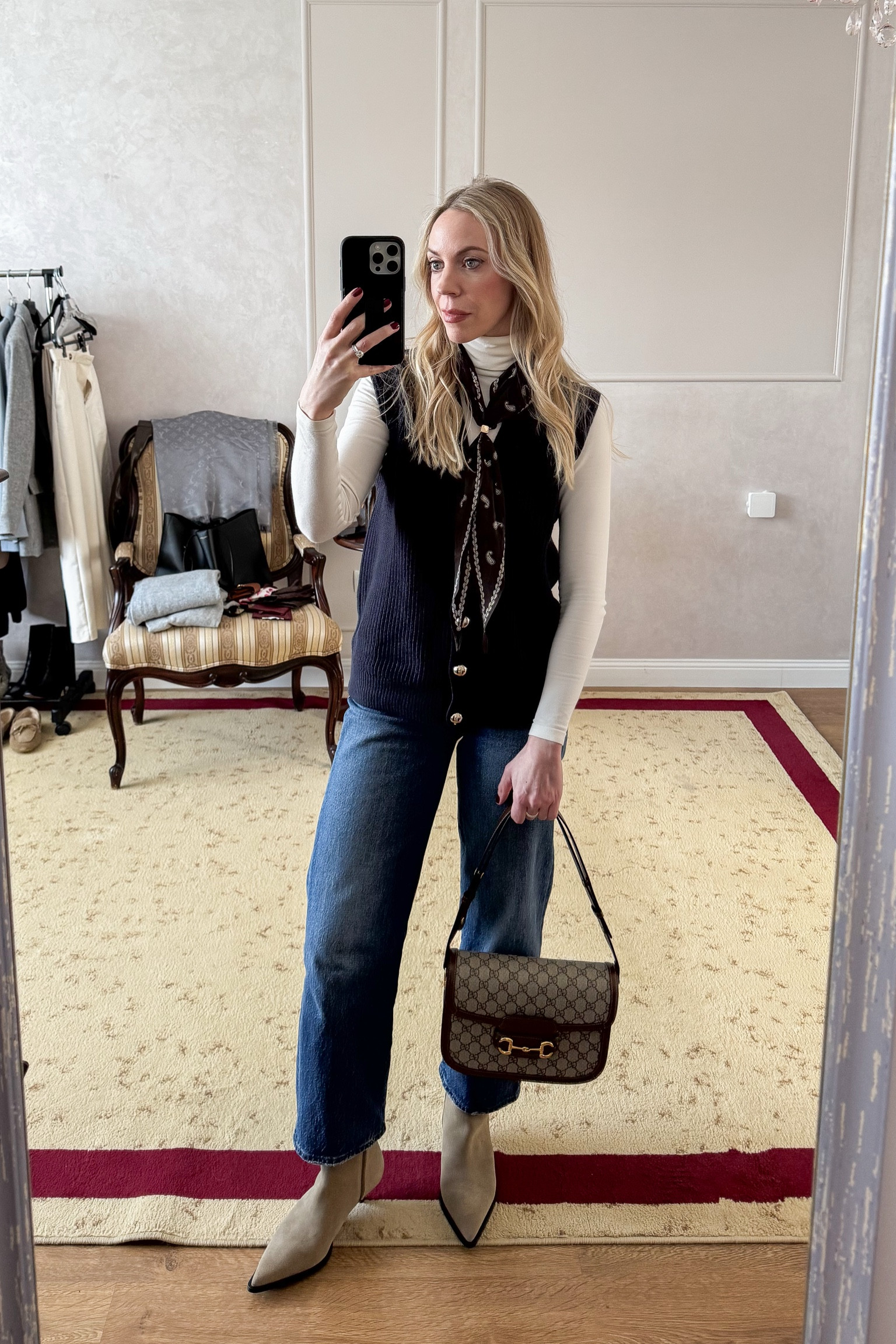 Sweater vest (under $30 - size up), bandana scarf, Levi’s ribcage ankle jeans (40% off orders over $200), suede western boots, Gucci horsebit bag, spring outfit 

#LTKItBag #LTKFindsUnder50 #LTKOver40
