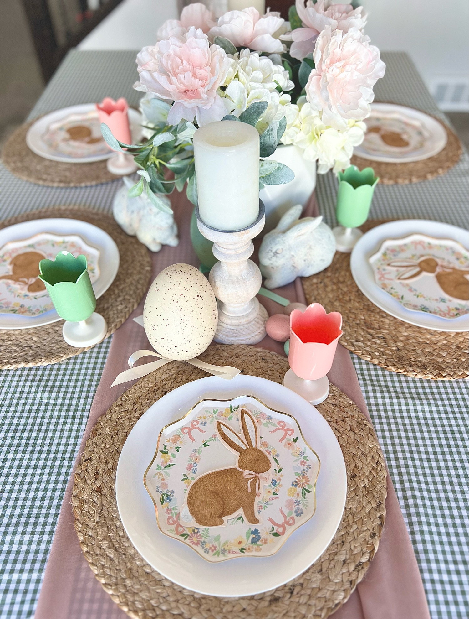 Our Easter table setting this year - that plate and napkin pairing has my heart! You could also switch the floral centerpiece for tulips to coordinate even better with the cups 🌷this time of year is so fun to decorate. 

#LTKSeasonal #LTKSpringSale #LTKparties