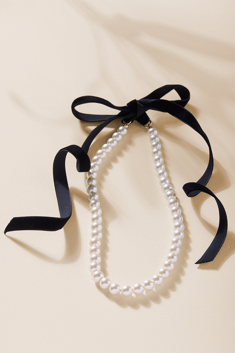 Dora Velvet Bow Pearl Strand Necklace | Francesca's