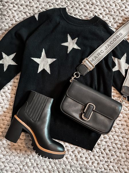 Sweater
Star sweater 
Marc Jacobs bag
Boots 
Black boots 

#LTKitbag #LTKshoecrush #LTKFind