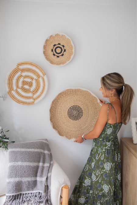 Looking to spruce up your home decor? These Coastal Farmhouse Hanging Wall Baskets are just what you need. With their woven design and varied sizes, they add a touch of texture and style to any sparse space. Hang them together or separately to create a unique and charming display. Don't miss out on the home decor aesthetic of 2023 - these versatile baskets are a must-have! Get inspired and transform your space with these beautiful woven baskets. Imported and ready to elevate your home decor ideas. Click for more furniture and home decor options. #homedecor #homedecoraesthetic #coastalfarmhouse2023 #homedecorideas