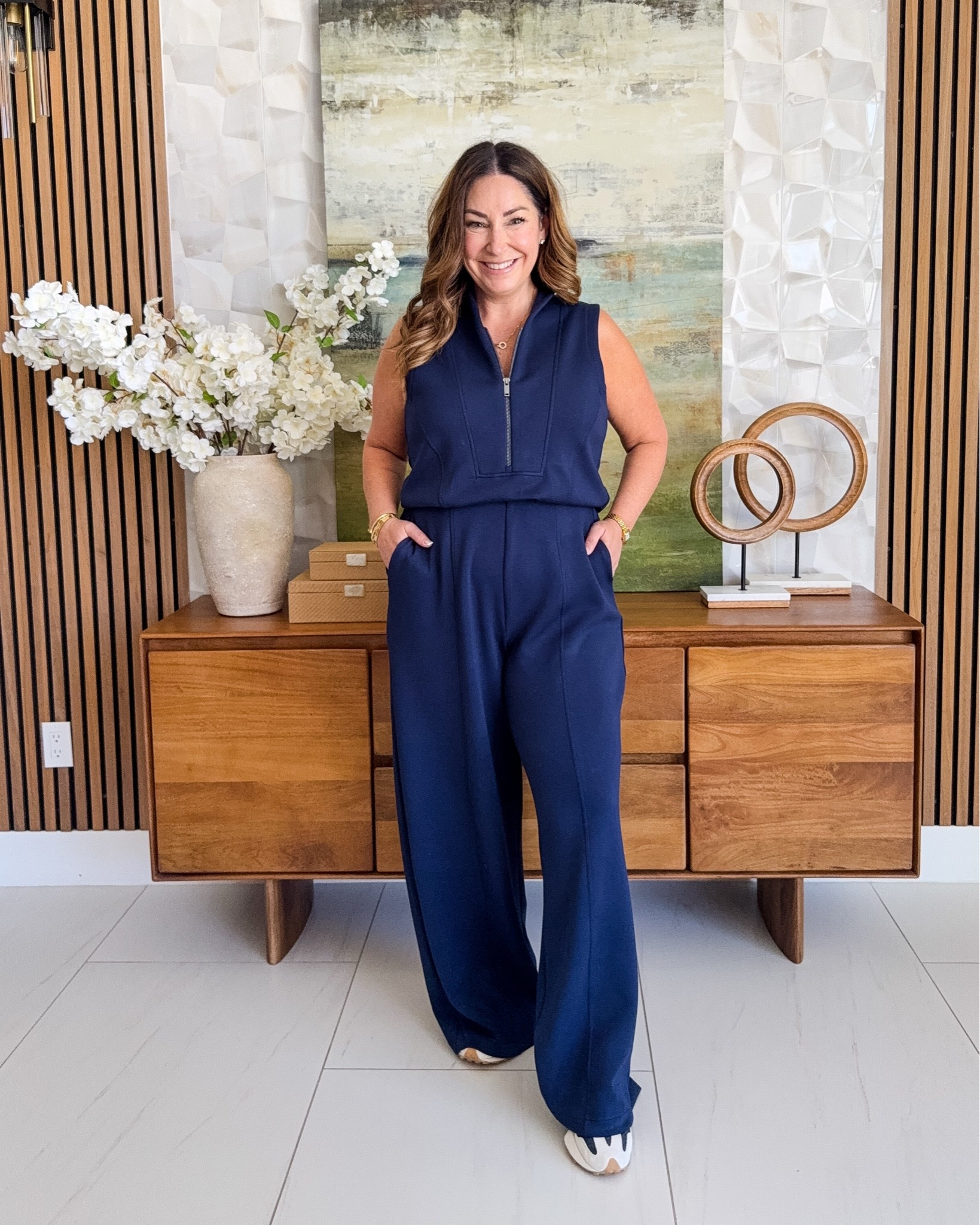 Your new go-to summer jumpsuit🖤 This new @spanx is a wardrobe staple —  super soft fabric, pockets and zip neckline plus the back splits for easy potty breaks! 

Wearing a large regular length |  5'5 / size 12 for reference

New customer code RYANNEXSPANX for 15% off plus free shipping 

#traveloutfit #spanxpartner

#LTKmomlife #LTKActive #LTKMidsize