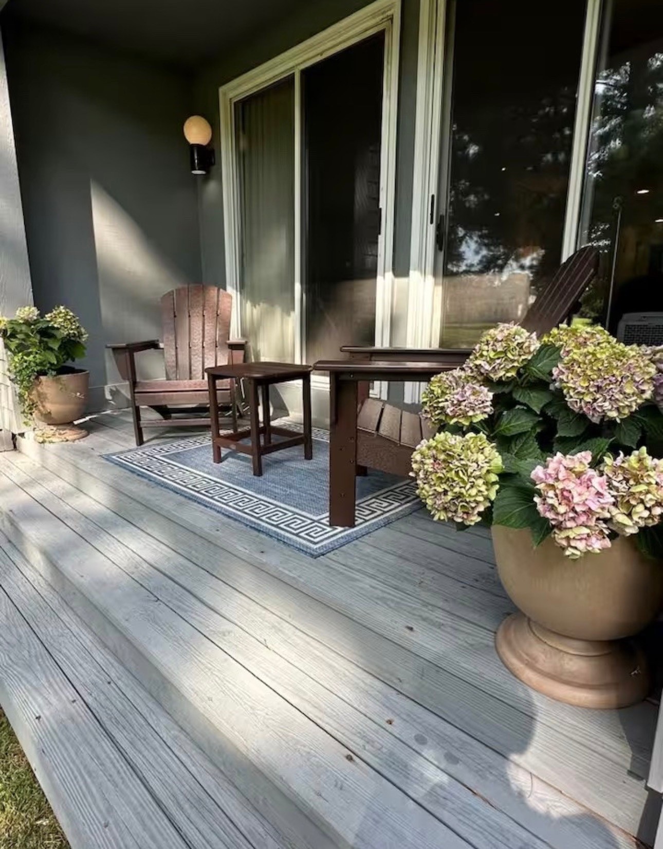 Outdoor adirondacks, rug, planters 


#LTKHome