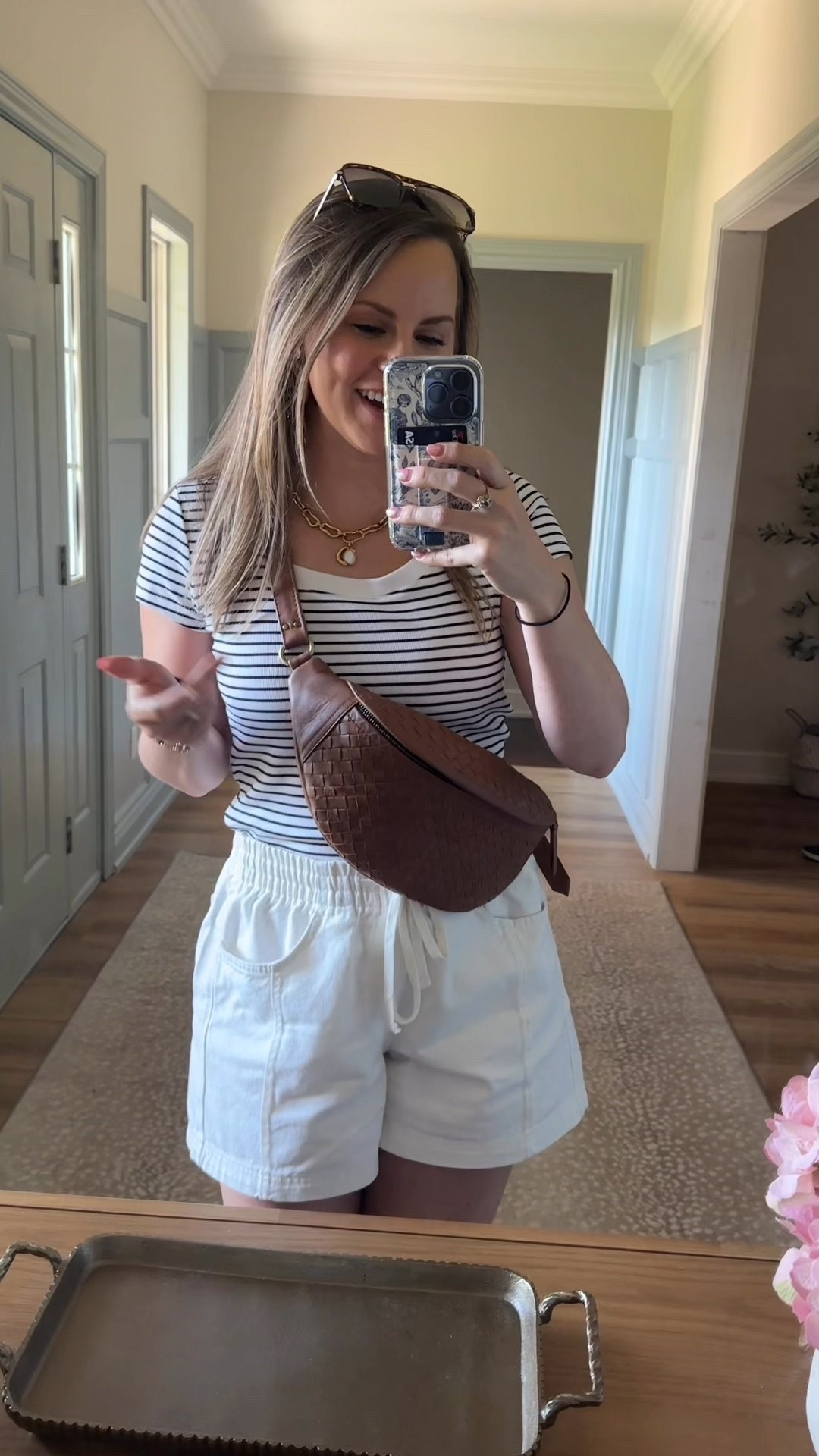 Loving this casual summer outfit!!! The cutest casual pull on drawstring relaxed denim white shorts and ribbed striped top! Wearing size M in both. 
 

#LTKSeasonal #LTKFindsUnder100 #LTKStyleTip