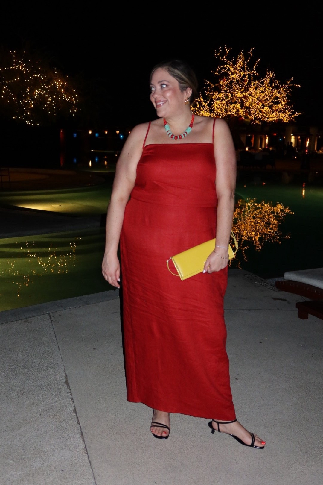 Reformation Frankie Dress in extended sizing in linen. Not available right now, but they usually bring it back. Usually size up in reformation dresses  


The Margaux heeled sandals are so comfortable. I sized up half a size (12.5) and they fit perfectly. Expensive, but who else carries 12.5?! 

The necklace makes the outfit. If you wear a lot of red it's such an outfit maker - same with the gold earrings! 