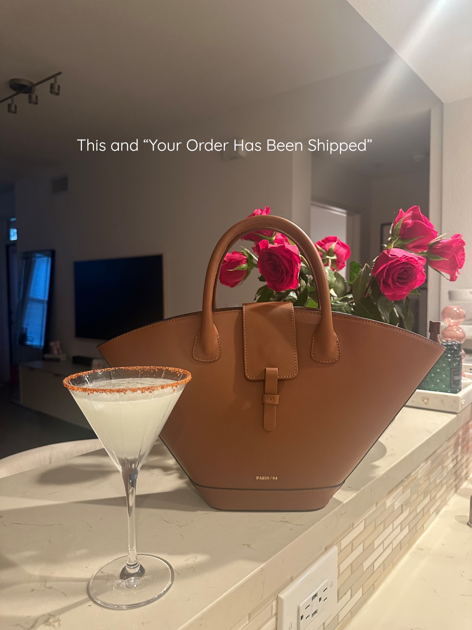 Evening essentials: a classic cocktail, fresh roses, and the most elegant structured tote 🤎 This bag looks designer but comes without the markup. Great for work or everyday.

#LTKWorkwear