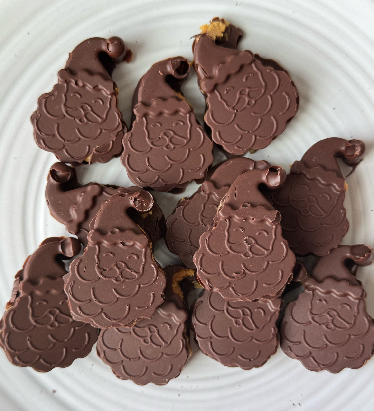 these came out tasting so good & were so easy to make! -for filling; mix 1/2 cup creamy peanut butter, 1/4 cup powdered sugar, 1tsp vanilla, dash of salt.  -for chocolate; melt 2.5 cups of chocolate chips in the microwave in 30 second intervals.  -put a small amount of chocolte in the molds. put in freezer for 5 mins. add peanut butter mixture, filling the mold 3/4 the way. top with leftover chocolate. put in fridge/freezer until fully hardened. :)  sooo easy and delicious!

#LTKHome #LTKSeasonal #LTKHoliday