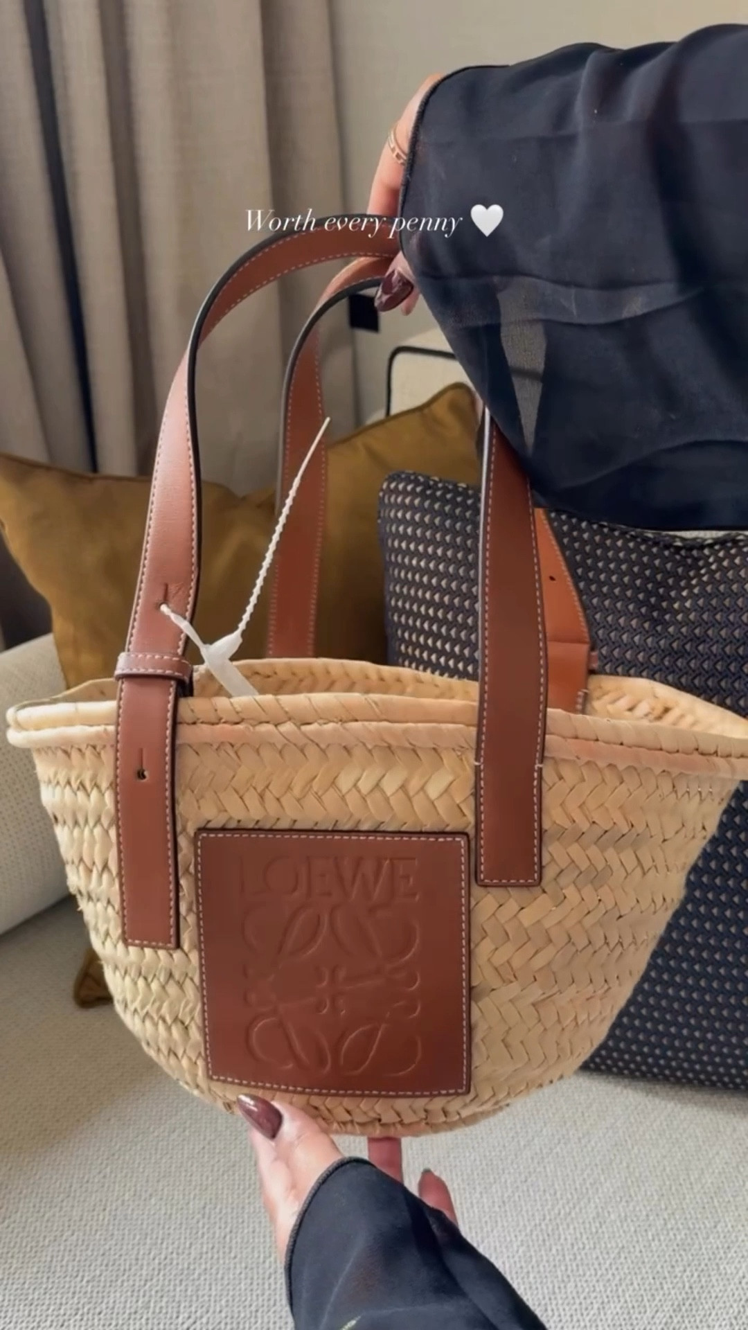 A little late upload of my Loewe Basket Bag 🤎 I bought it for my last holiday and already know it’s coming with me on the next one too! It’s my first Loewe piece, and I have to say… I get the hype.

If you’re after a luxury bag that’s lightweight, fits all your travel essentials, and still looks effortlessly put together this is the one. The tan leather detailing and craftsmanship are just stunning ✨
.
.
.
.
.
loewe basket bag, luxury lifestyle, home styling, apartment living, travel essentials, designer bag, aesthetic living, weekend vibes, everyday luxury, cosy interiors, lifestyle creator, minimal aesthetic, home and style, neutral tones, elegant living, bag lover, elevated basics, curated finds, capsule wardrobe, soft neutrals, luxury details, Loewe bag