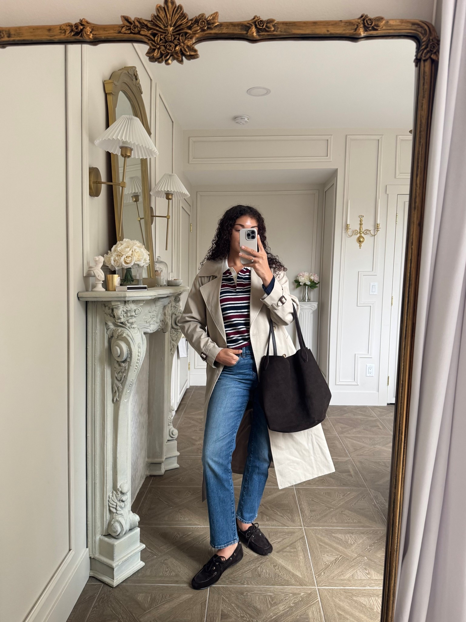 Preppy spring outfit: trench coat, boat shoes, jeans, suede bag, and a sweater polo

#LTKootd