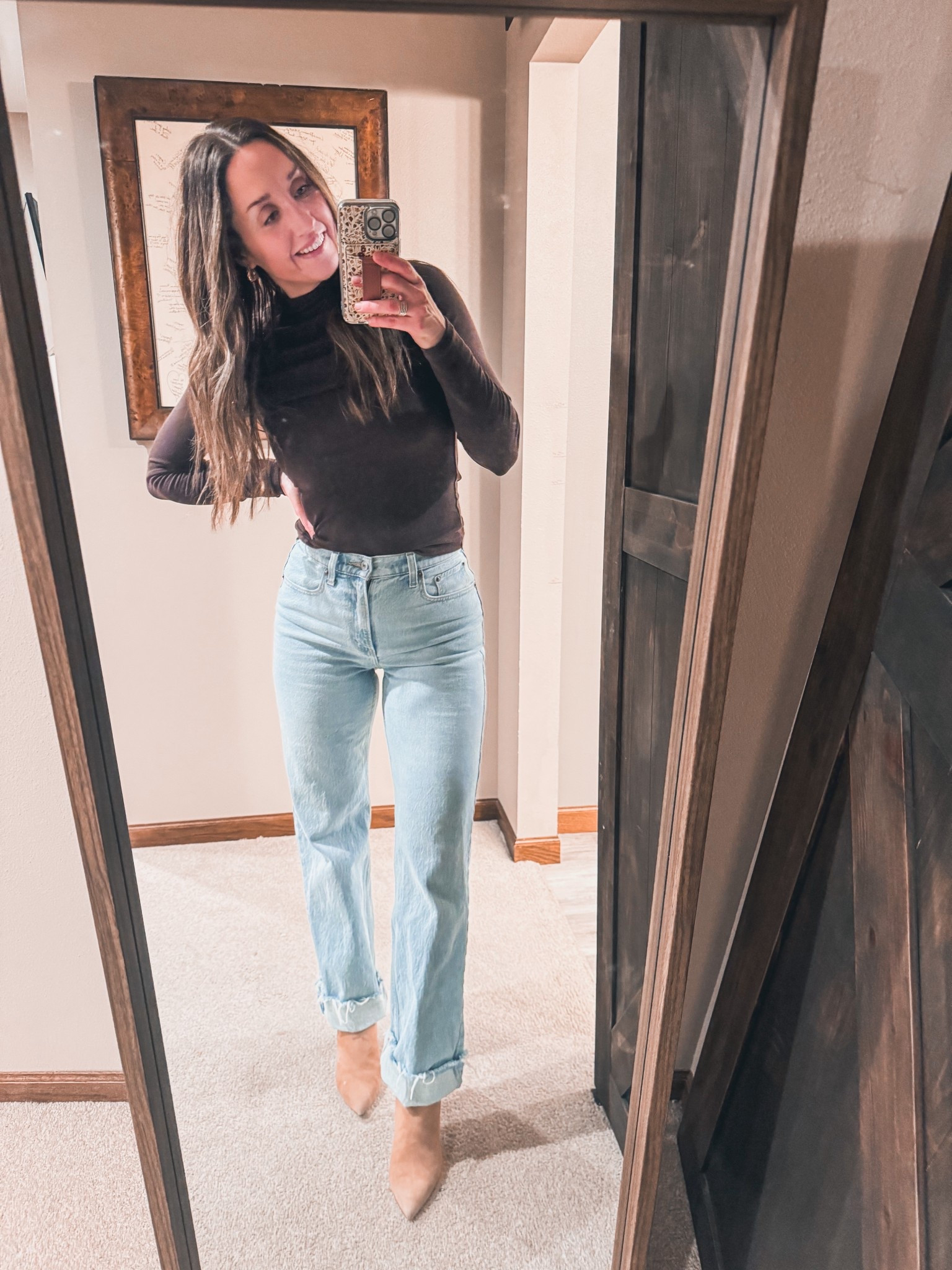 Cute and cozy is the vibe. Wearing a small top, size 26 jeans, and size 8.5 shoes 