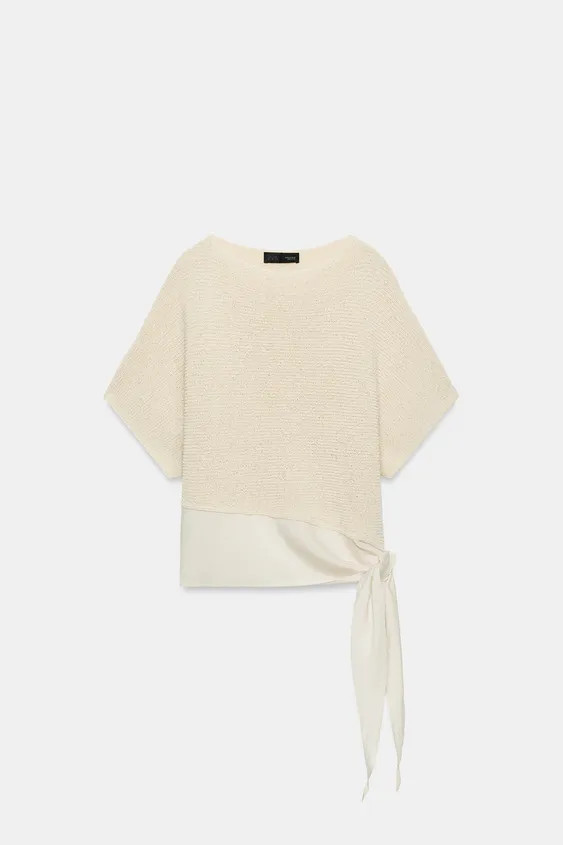 Round neck, short sleeve top. Asymmetric hem with contrasting fabric and side tie. | Zara UK