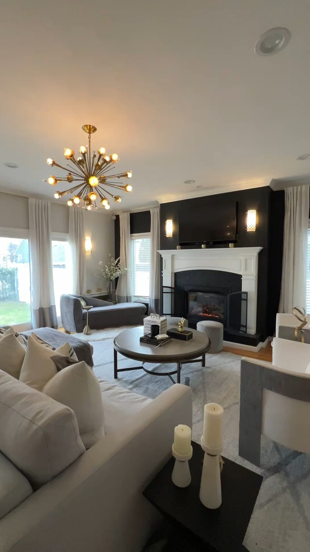 Still obsessed with this Jonathan Adler living room chandelier and wall sconces. It’s so cozy and warm!! 

#LTKHome #LTKOver40 #LTKdayinmylife