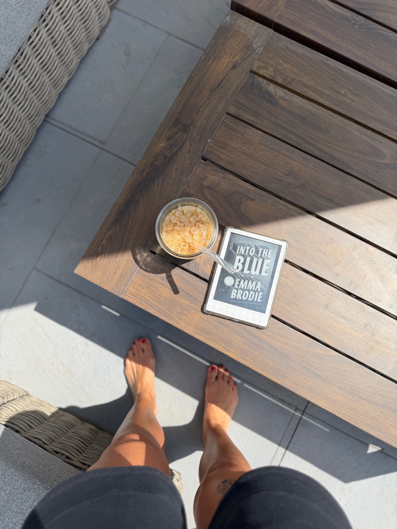 Sun + ice coffee + book 👌

#LTKHome