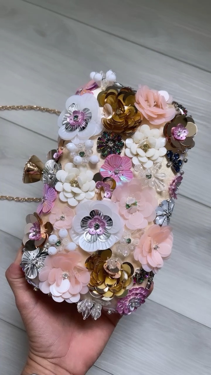 The most beautiful little clutch!!!! It comes with a removable chain strap and a smaller handle strap! You can also choose to tuck them in and carry as a clutch! 

#LTKFind #LTKsalealert #LTKitbag