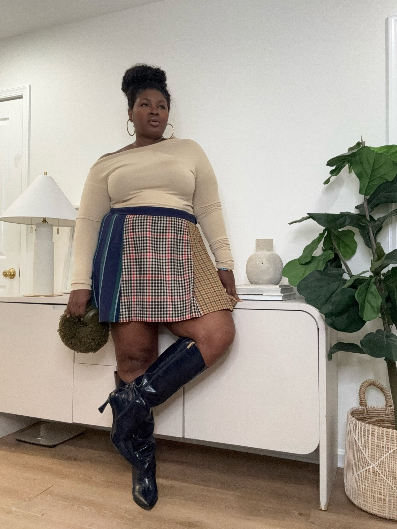 A classic fall outfit formula: a neutral top + plaid skirt + knee high boots. This look blends timeless patterns with modern styling, making it an easy outfit idea for anyone wanting a chic fall wardrobe refresh. fall outfit ideas, plaid skirt outfit, knee high boots outfit, preppy fall fashion, neutral outfit ideas, plus size fashion, curvy outfit ideas, fall wardrobe essentials, chic fall outfit, casual fall outfit, autumn fashion trends, skirt outfit ideas, cozy fall style, everyday outfit inspiration, elevated casual style

#LTKootd #LTKSeasonal #LTKMidsize