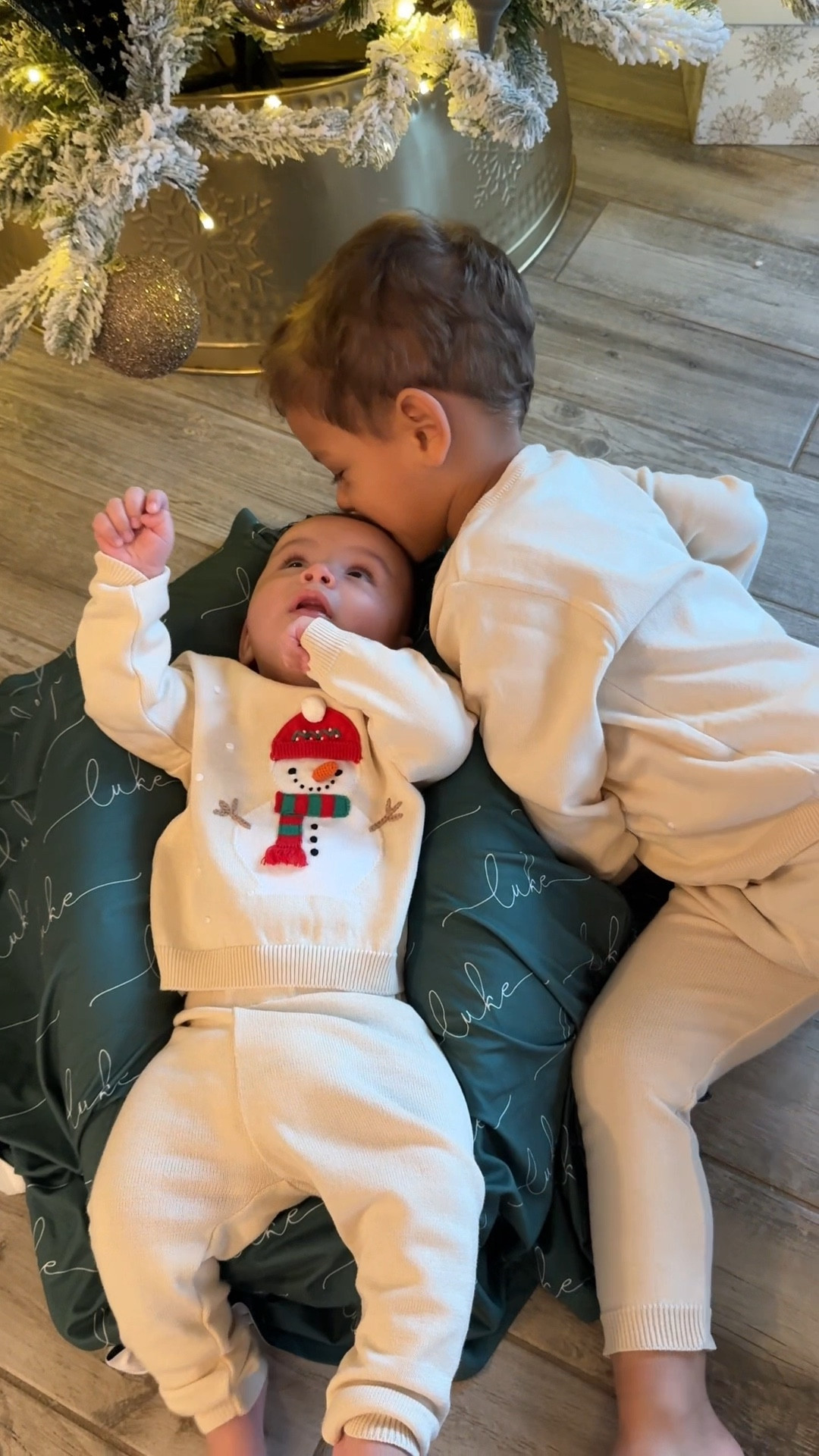 #ad
I’ve waited for this moment… matching my two boys in the sweetest holiday outfits from @feltmanbrothers 🤍✨
My heart can’t handle how precious they look sitting by the tree in their little classic sets.
Creating memories I’ll replay forever. ✨
#feltmanbrothers 

#LTKHoliday #LTKKids