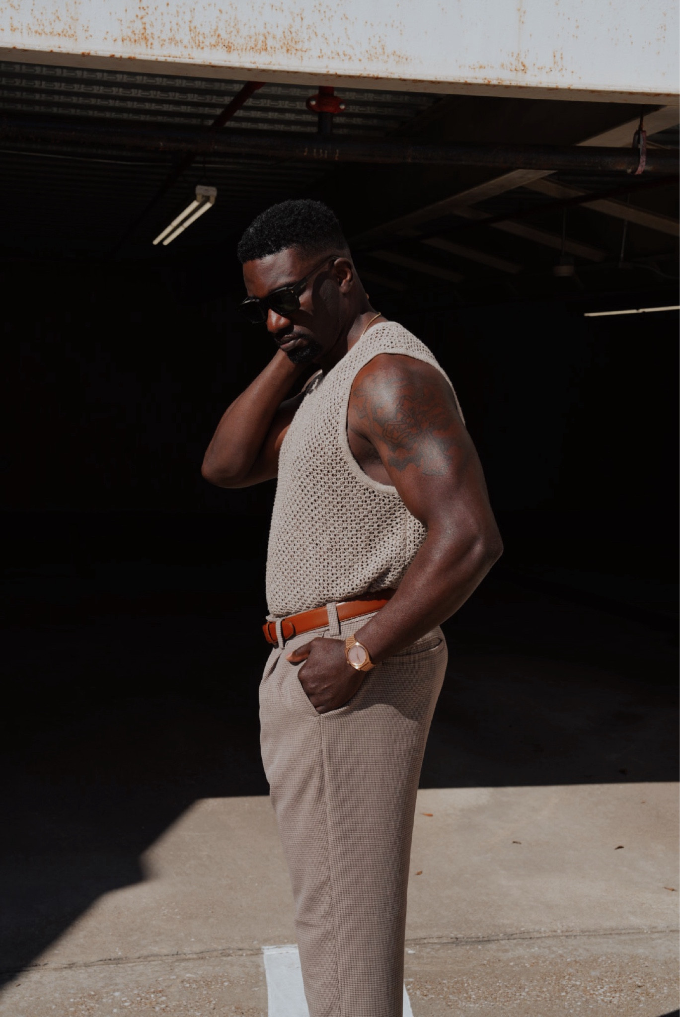 Men’s sleek casual outfit featuring a knit sleeveless shirt and pleated trousers 

#LTKmens #LTKstyletip 

#LTKSeasonal