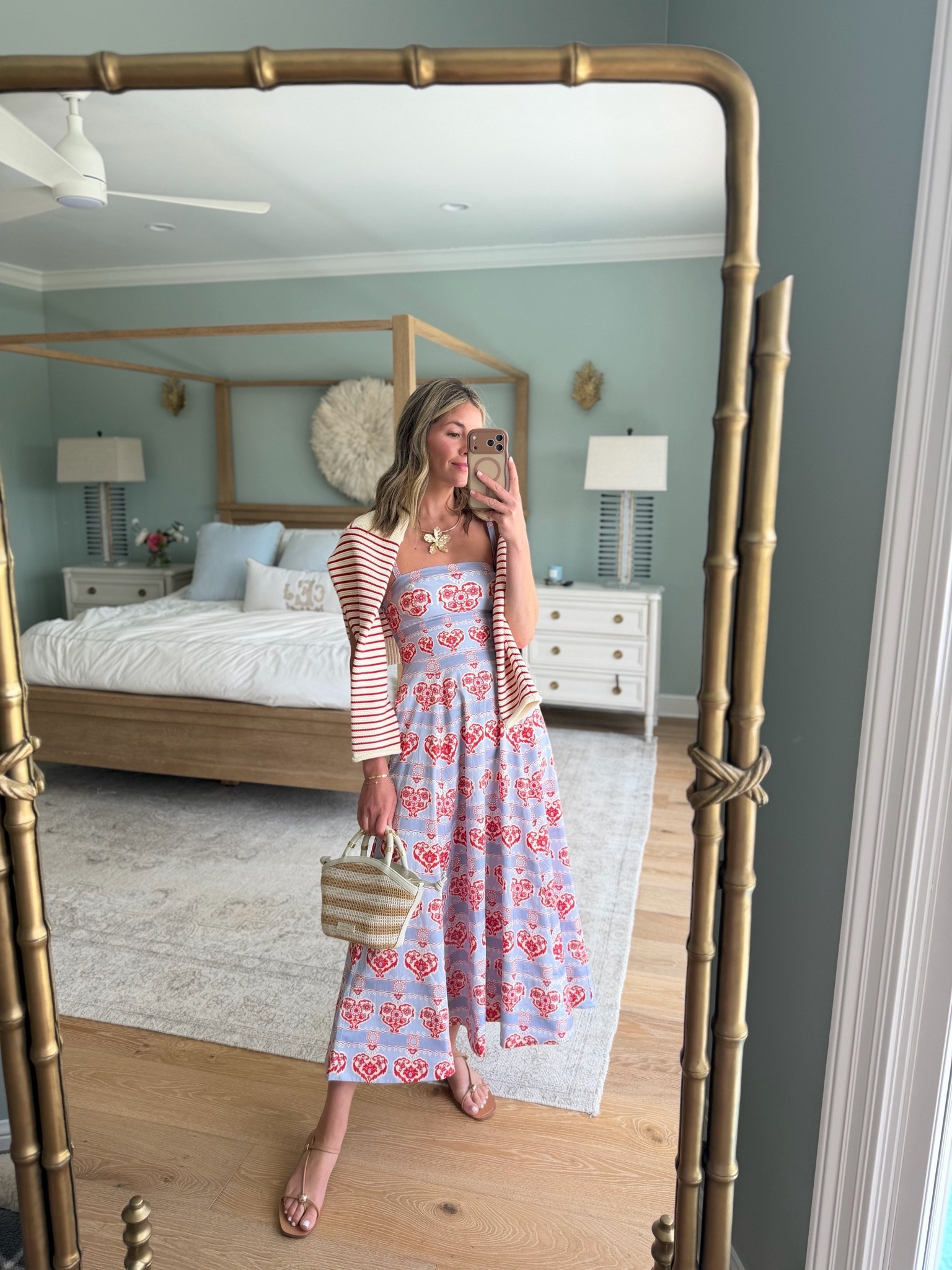This dress is one of those easy summer pieces that instantly feels put together with minimal effort. I love the print, the smocked fit, and how lightweight and comfortable it is for warm weather days. Paired it with a striped cardigan, simple sandals, and a statement necklace for weekend lunch. Wearing an XS in the dress.

And my mini raffia bag is from my collection with J. Lowery but isn't linkable on LTK! 

 #LTKootd #LTKSeasonal