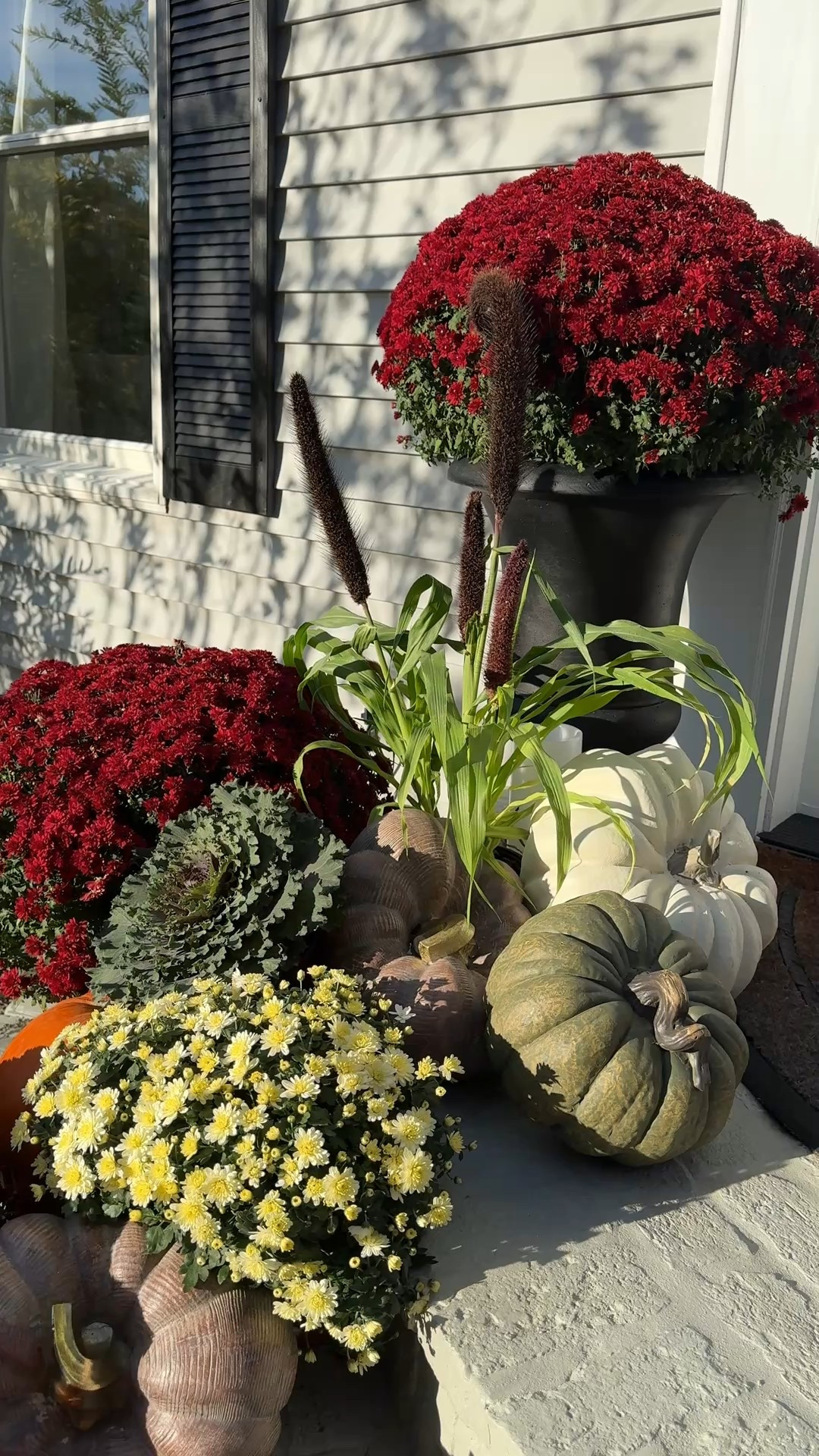 Outdoor front door black planters from Lowe’s! 

#LTKHome #LTKHalloween