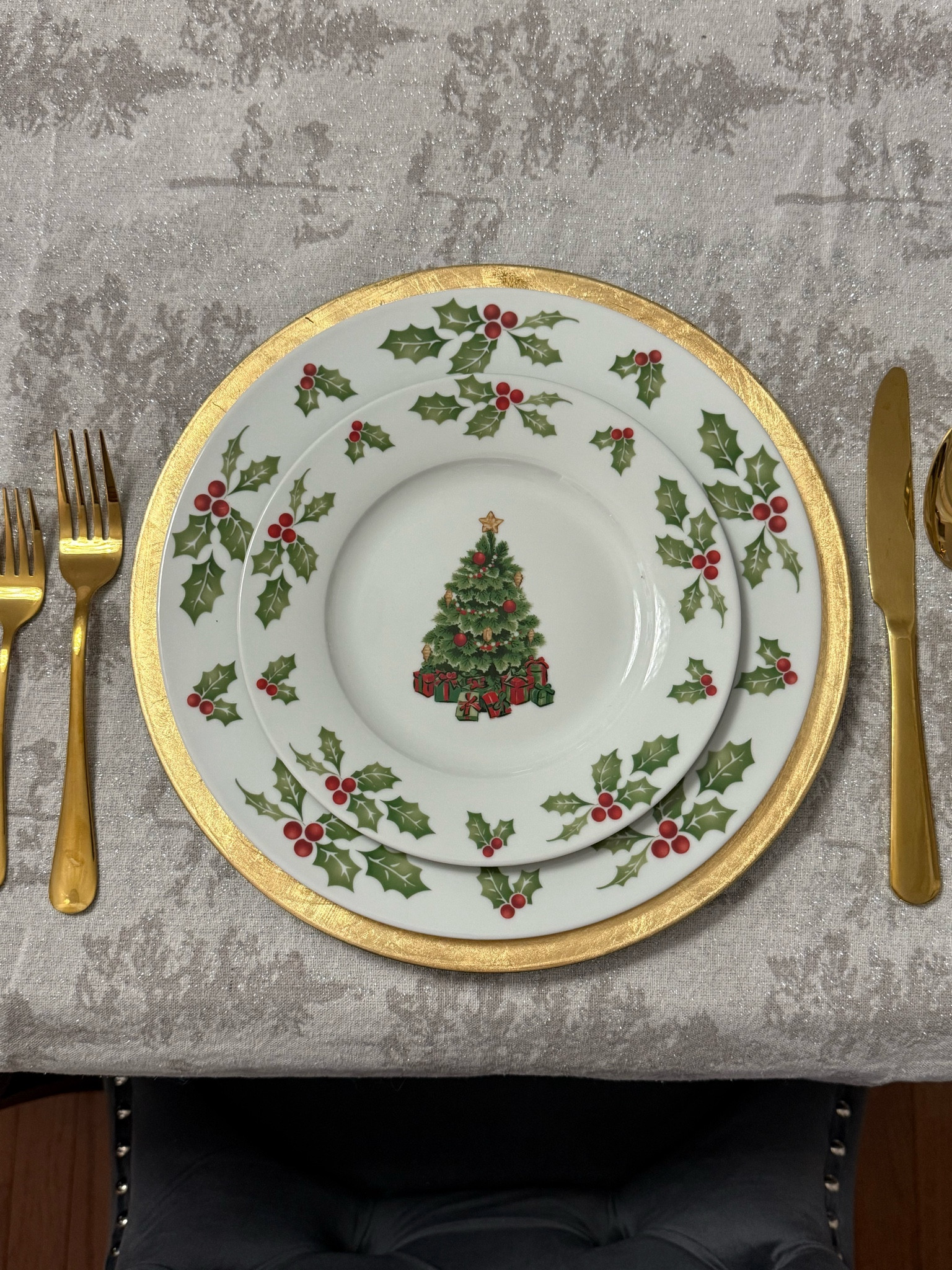 Christmas dishes. Holiday dishes. Hosting. Christmas party. Dinner party. Holiday party. Christmas tree plays. Charger plates. Gold silverware. 

#LTKSeasonal #LTKHome #LTKHoliday