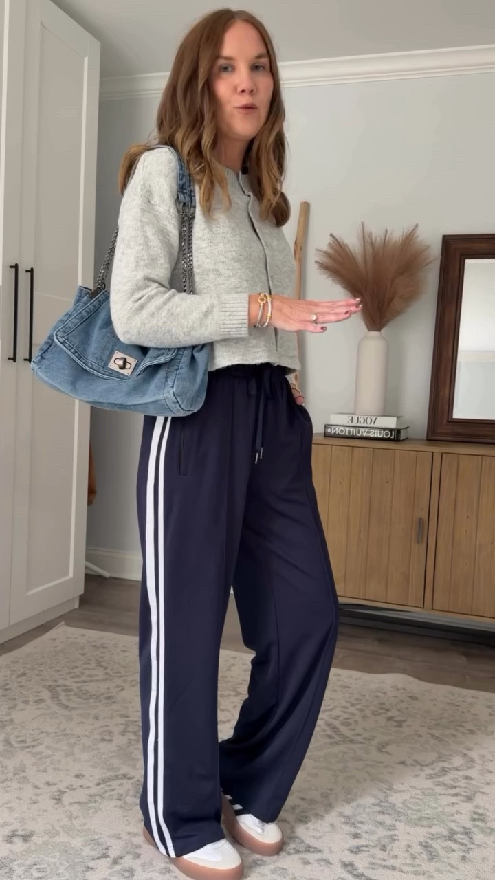Your leggings might be getting the season off. 👀

Track pants are officially my favorite way to do comfortable fall style without looking like I’m headed to the gym. These have that relaxed, effortless feel I want from leggings, but the wide-leg silhouette + side stripe instantly make an outfit feel so much cooler.

I paired them with a cropped cardigan, sneakers and an oversized denim bag for an effortless cool mom outfit that’s comfortable enough for errands but still feels completely pulled together.

If you’re looking for leggings alternatives for fall, casual fall outfits, track pants outfits, elevated athleisure, sporty chic style, comfortable mom outfits, or an easy everyday fall outfit—THIS is the formula. 🙌

Save this one for your next “I want to be comfortable but still look cute” day.

#falloutfits #casualfallstyle #trackpants #momstyle #elevatedcasual

#LTKmomlife #LTKOver40 #LTKSaleAlert