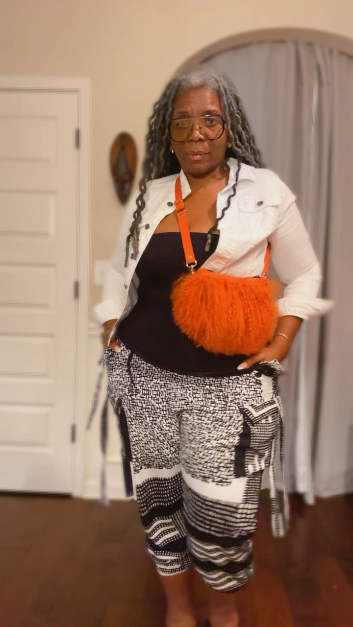 These pants are so versatile.  I love pairing them with this denim jacket for a comfy office to date night look. And the orange purse truly sets this off.  

#LTKPlusSize #LTKFindsUnder50 #LTKFindsUnder100