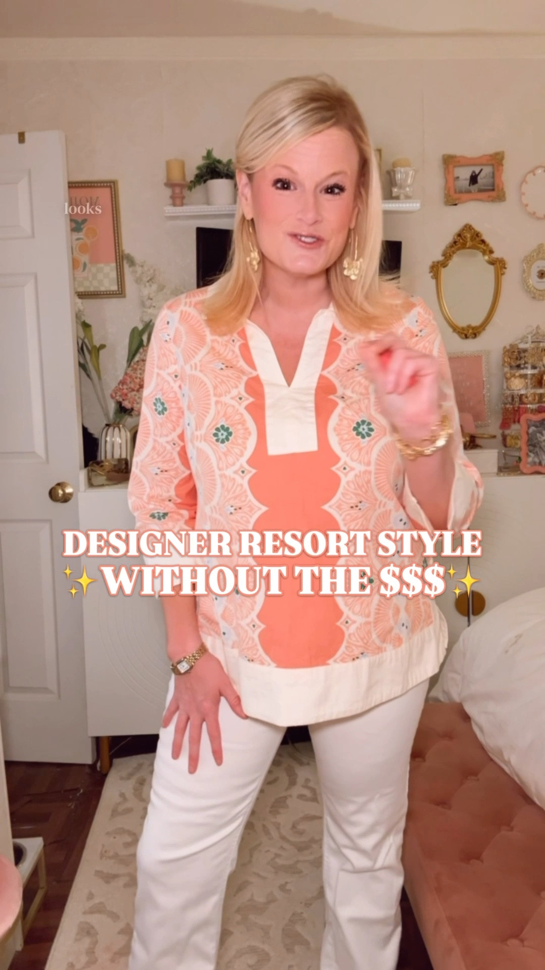 Designer Resort Style Without the Designer Price Tag. And She’s a Belk Doorbuster. 🌸

The coral and cream scallop medallion pattern. The contrast white collar placket. The contrast hem and cuff trim. This is the design language of a $200+ resort boutique top and it is for a fraction of that cost. 

100% cotton. Breathable, structured, and crisp in the way that resort cotton always is. Pullover. Split collar. 3/4 sleeves with contrast cuffs. 24.75 inches. Machine washable. The kind of top that looks intentional paired with white jeans, white shorts, or a linen trouser and absolutely nothing else required.

I am in a medium.

It gives:
🌸 Palm Beach resort style
🌸 Vacation outfit
🌸 Spring work outfit with white trousers
🌸 Country club and garden party
🌸 Lilly Pulitzer energy at a Belk doorbuster price
🌸 The top your whole trip gets built around

Lilly Pulitzer look for less, Lilly Pulitzer dupe, Tuckernuck look for less, resort wear women, resort style women, Palm Beach style, Palm Beach outfit, vacation outfit women, vacation outfits beach, preppy style women, preppy top women, popover top women, popover blouse women, cotton blouse women, coral top women, spring top women, spring outfit women, spring outfits, print blouse women, scallop print top, contrast trim blouse, split neck top women, 3/4 sleeve top women, country club outfit women, garden party outfit women, spring work outfit, affordable resort wear, belk fashion finds, crown and ivy top, designer look for less, coastal style women

#LTKFindsUnder50 #LookForLess #PreppyStyle #ResortStyle #VacationOutfit 

#LTKSeasonal #LTKOver40 #LTKSaleAlert