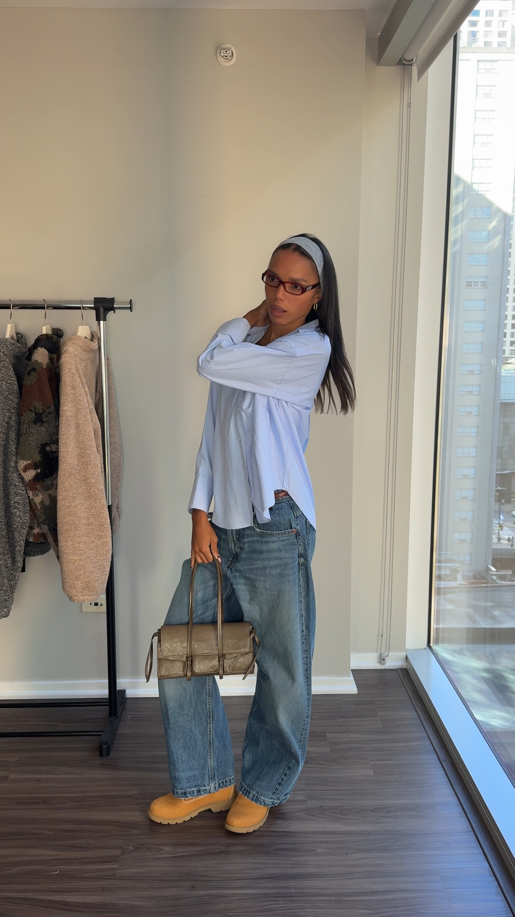 Exact products: 
Shirt - Zara (8372/060)
Jeans - Zara (3607/025),
Bag - Zara (6246/410), 
Belt - Zara (6399/208), 
Shoes - Timberland,
Headband - Amazon,
Glasses - Lexxola 
