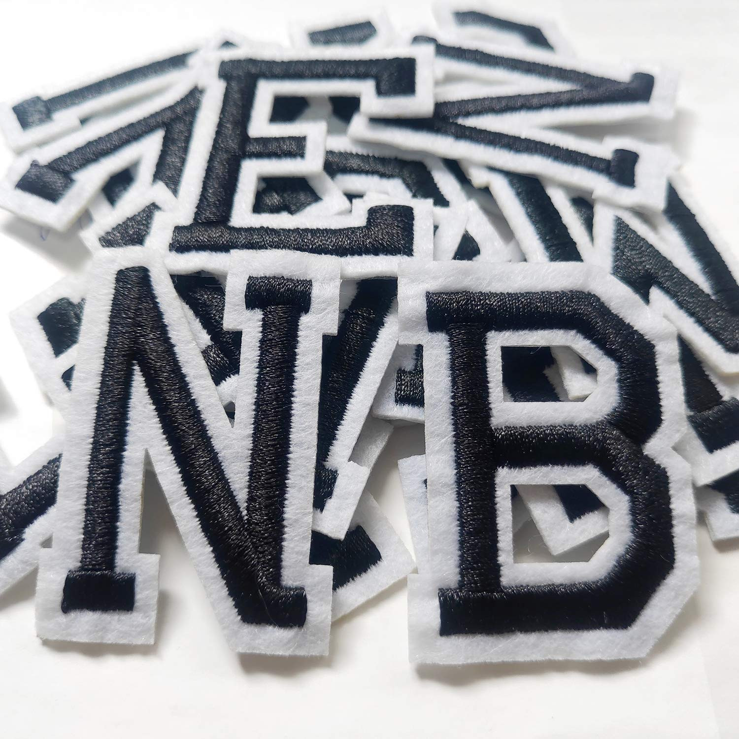 Iron on Letter Patches 52 Pieces,bfuee Letter Patches Alphabet Embroidered Patch A-Z,for Hats Shirts Jeans Bags Black | Amazon (US)