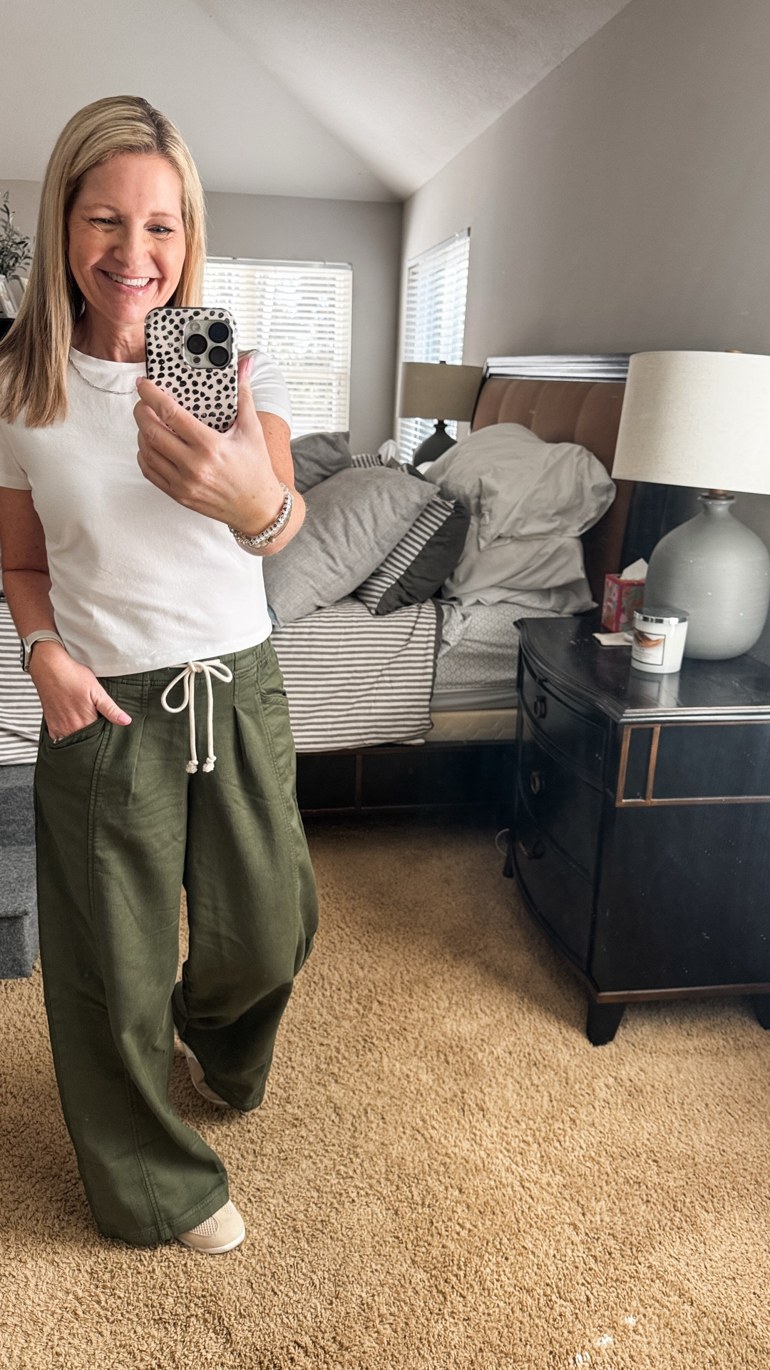 If you know me, I rarely ever buy anything full price so when I saw these Aerie pants in store, I stalked them for weeks waiting. The minute they went on sale, I grabbed the green pair but they come is 3 other color options. I love the wide leg fit, pleated details and the drawstring waist. I feel like these can even be dressed up a notch too. Grab them while they are on sale. 

My baby tee is from Abercrombie and my sneakers are Target. 

#LTKSaleAlert #LTKOver40 #LTKootd