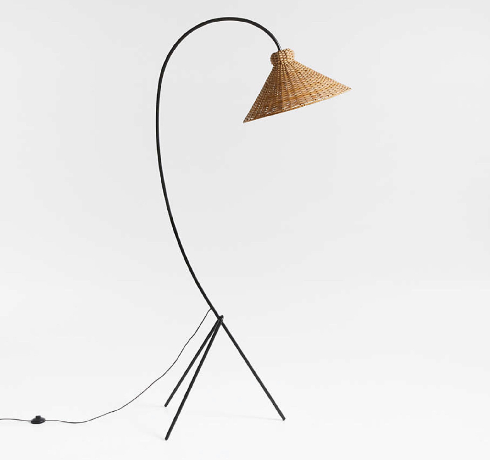 Black metal arc rattan floor lamp by Athena Calderone for Crate & Barrel 

#LTKhome #LTKstyletip #LTKSeasonal