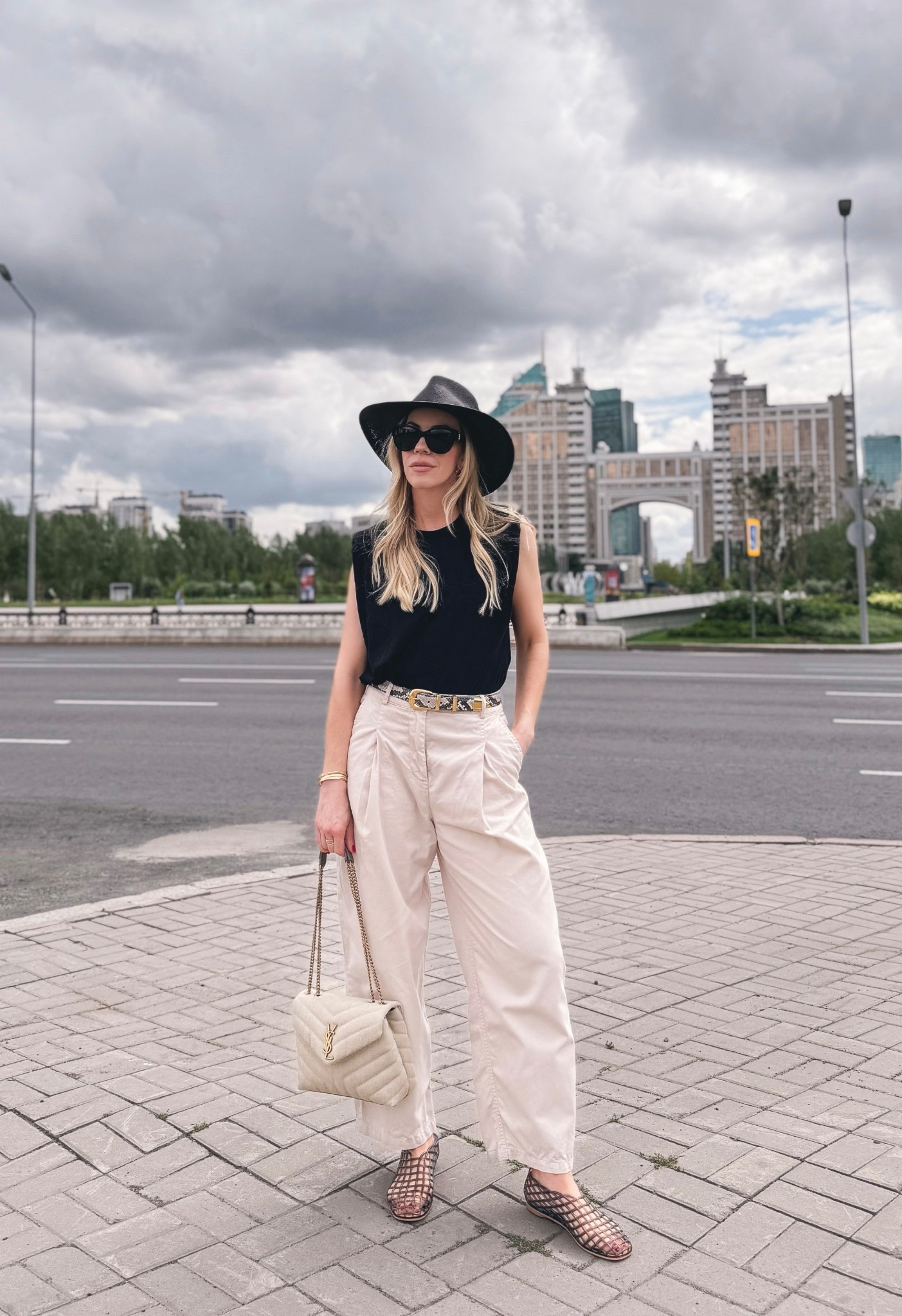 Summer outfit, cropped pants, black tee, black straw hat, jelly shoes, snakeskin belt

#LTKOver40 #LTKTravel #LTKSeasonal