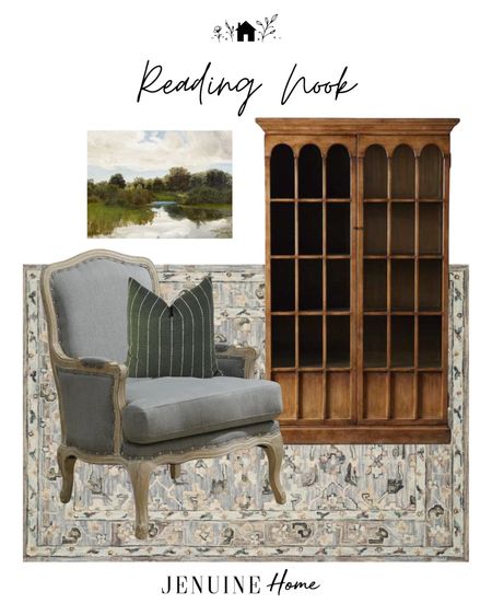 Landscape art. Book nook. Reading nook. Wood classic bookshelf. Neutral traditional rug. Blue grey armchair. Green and white throw pillow  