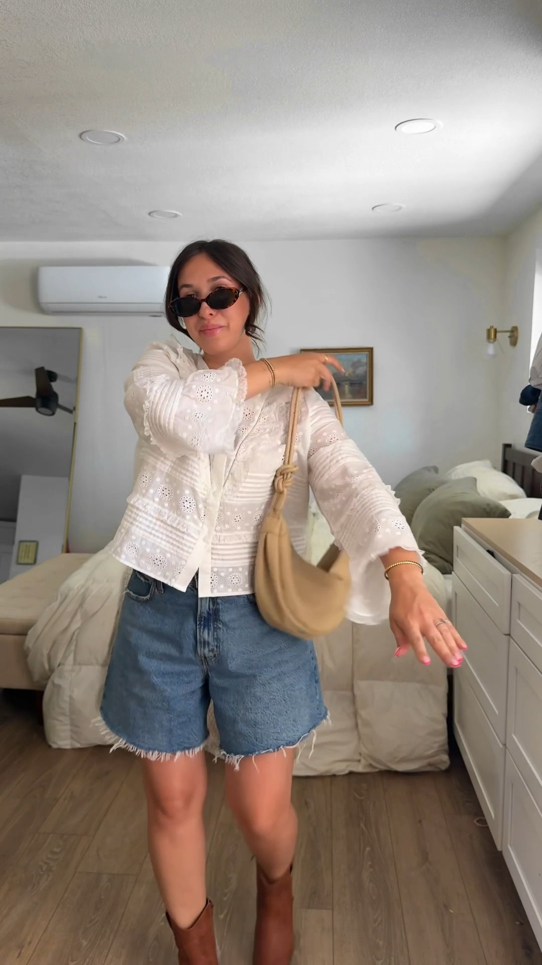 Simple ootd 🤍 country outfit, summer outfit, simple style, white blouse, sezane top, Abercrombie shorts, summer shorts, denim shorts, loose shorts, baggy shorts, cowboy boots, slouchy bag, 

#LTKPetite #LTKStyleTip