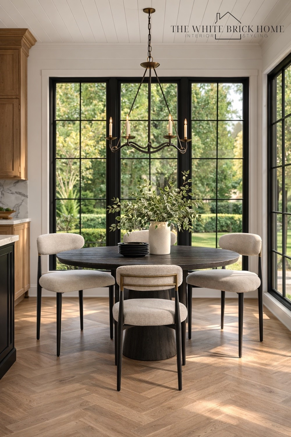A sun filled dining nook where warm wood tones, soft neutrals, and a stunning create an elevated everyday gathering spot. 

These chairs and dining room table ship for free from wayfair! 
🖤🖤
Dining furniture, eat in area, dining table, chandelier, round table, dining chair, eat in kitchen, open kitchen, kitchen inspiration, kitchen furniture, kitchen decor ideas, home decor ideas, dining room decor, dining room furniture, wayfair furniture, wayfair dining room ideas, wayfair decor ideas, home decor, home design, kitchen decor, wayfair, lumens, visual comfort lighting 


#LTKSeasonal #LTKHome #LTKSaleAlert
