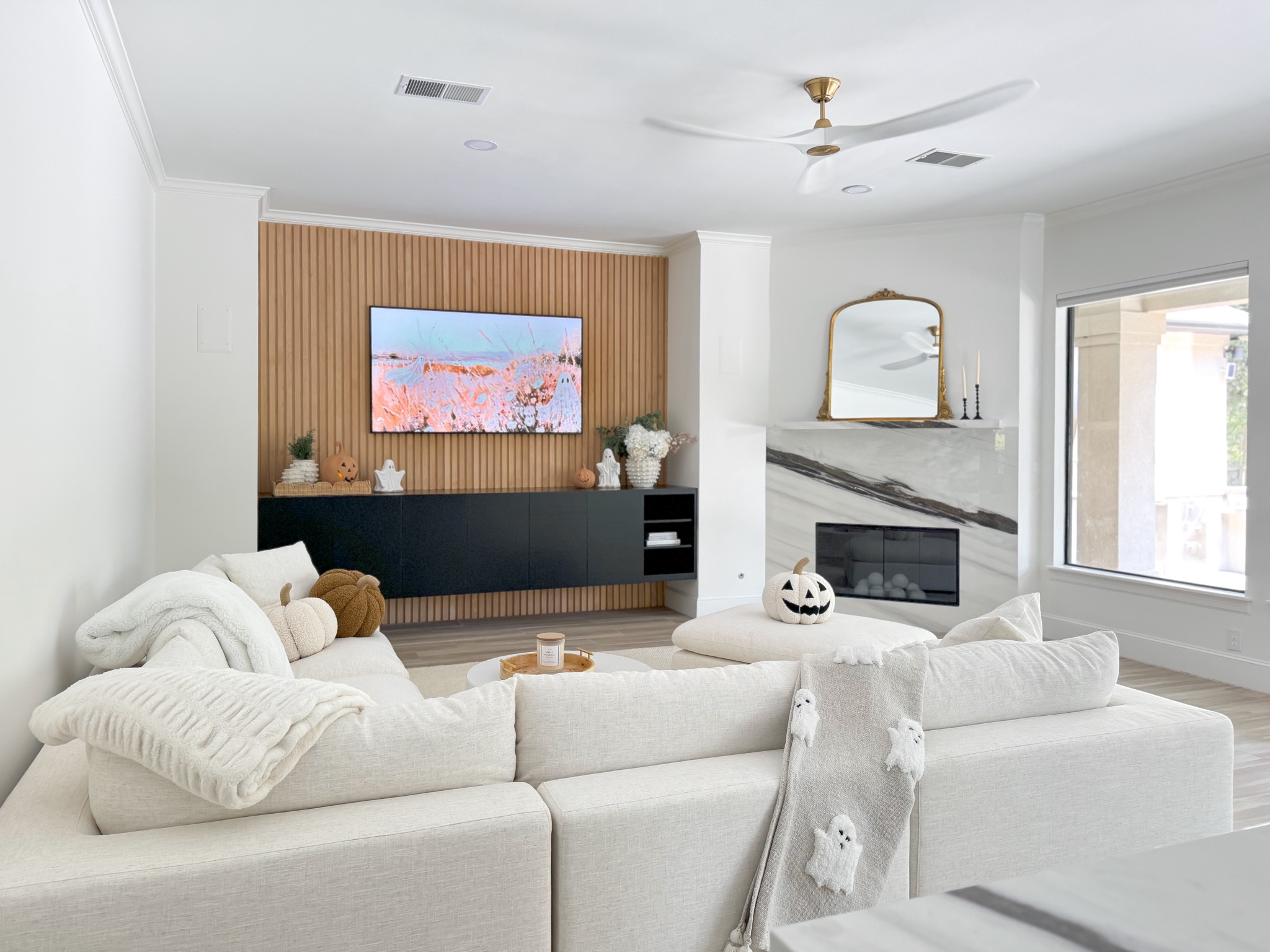 Spooky vibes in the living room! 

Love our new Castlery Dawson couch & 75” Samsung The Frame tv.

Pillows and Halloween decor is Potterybarn.

#livingroom #potterybarn #halloween #samsung #theframetv #tjmaxx #anthropologie 

#LTKSeasonal #LTKHome #LTKFindsUnder100