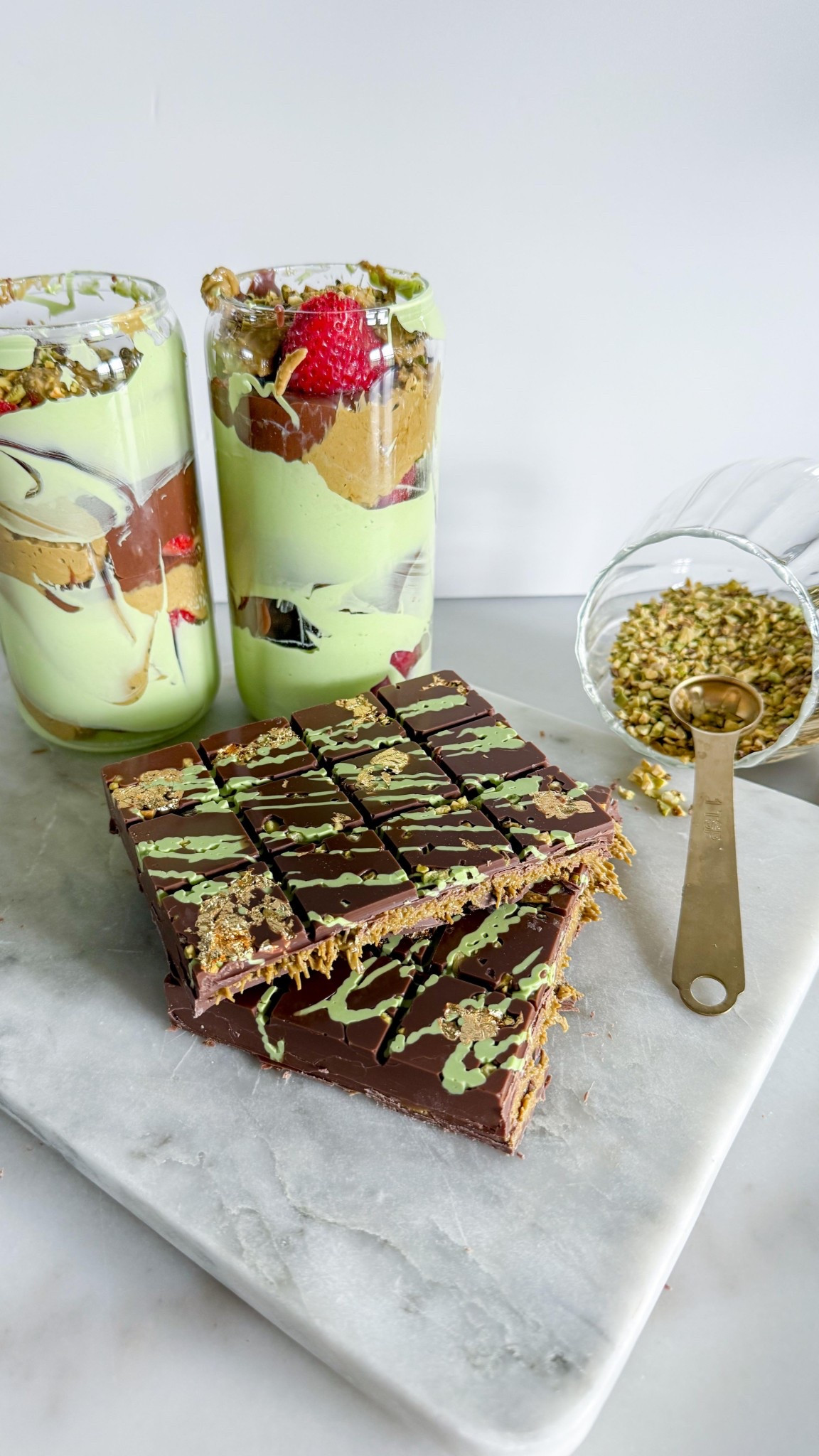 Tried the viral Dubai chocolate bar + strawberry cup at home and OMG… I’m obsessed!
I eyeballed the whole thing, no real recipe—just vibes—and somehow it turned out insanely good and SO pretty. Like, how is this not in a fancy dessert shop?!
Super simple, barely took any time, and 100% worth the hype.

Here’s what I used for my version:
• 3.5 oz kataifi
• Campo d’Oro pistachio butter (6.3 oz)
• 2 tbsp butter (for toasting)
• Milk chocolate wafers
• Silicone mold

Save this for when you want to impress without actually doing that much.

#DubaiChocolateBar #StrawberryCup #EasyDesserts #NoRecipeRecipe #XOXOTerri #ViralTreatTested #PistachioLovers
